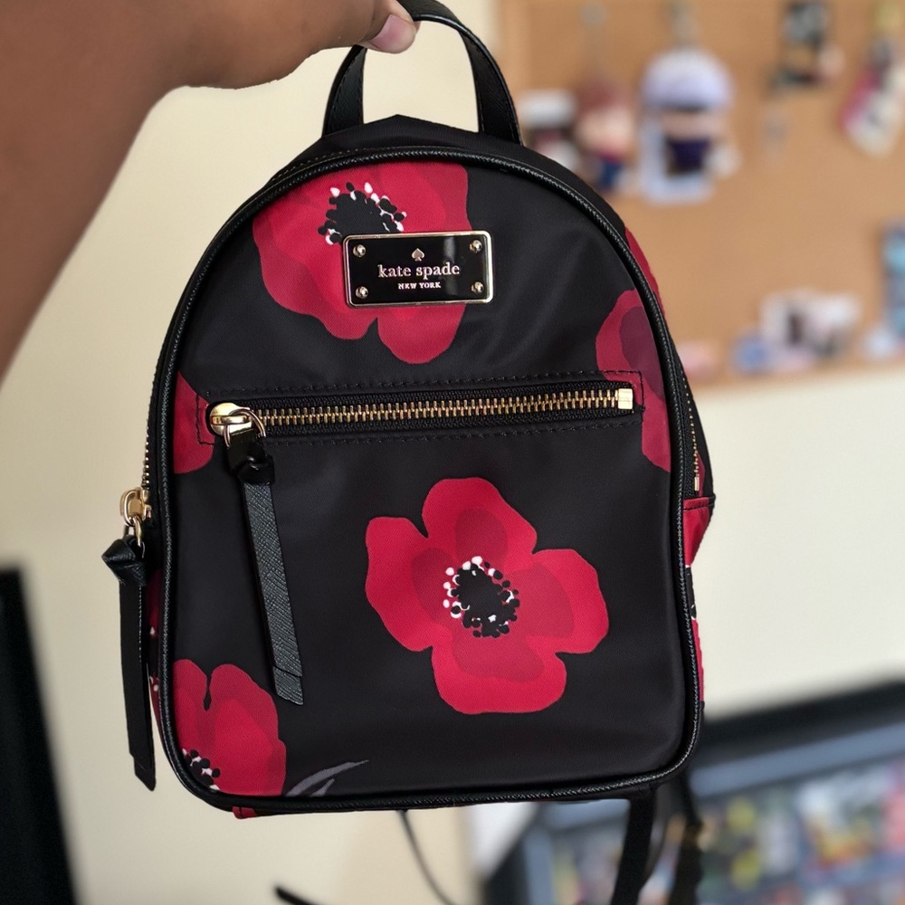 Lightly used Kate Spade poppy mini backpack